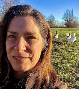 Audrey Morris and her flock of Cotton Patch geese