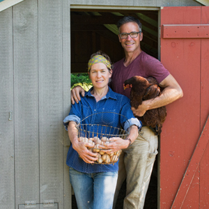 Jim and Annile Schultz outside of their chicken house